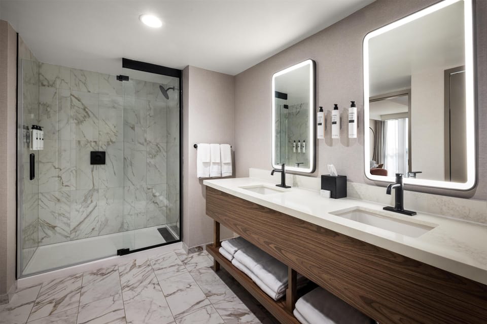 Suite, 1 Bedroom | Bathroom | Combined shower/tub, free toiletries, hair dryer, towels