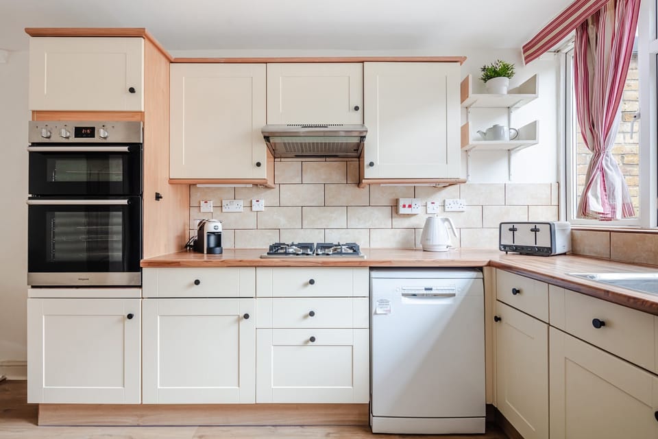 The kitchen is fully equipped to prepare a simple meal