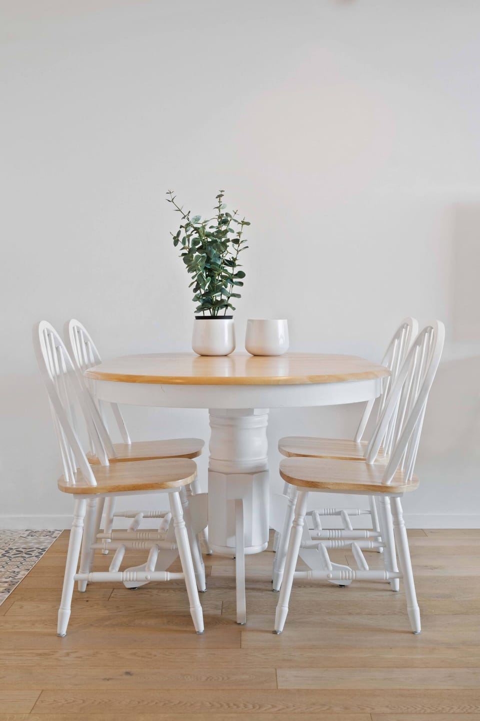 Charming dining area with a round table and seating for four, perfect for enjoying meals or casual gatherings.