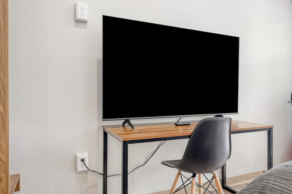 Deluxe Room, 2 Queen Beds, Mobility Accessible | Living area | 55-inch LED TV with digital channels, Netflix, Hulu