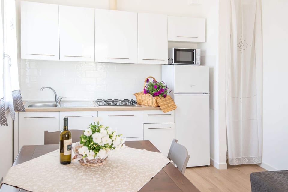 Condo, 1 Bedroom, Ground Floor | Living area | Flat-screen TV