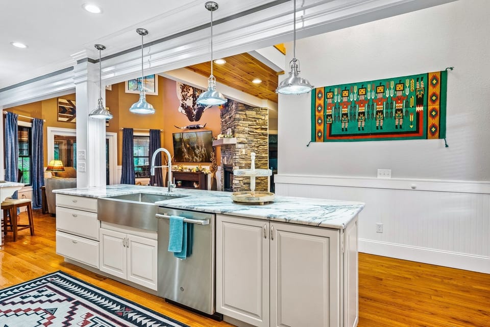 The deep sink features a whisper quiet garbage disposal.