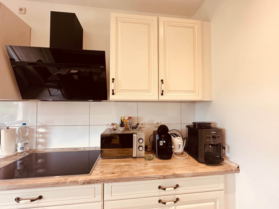 Kitchen equipment including coffee machine, microwave and air fryer