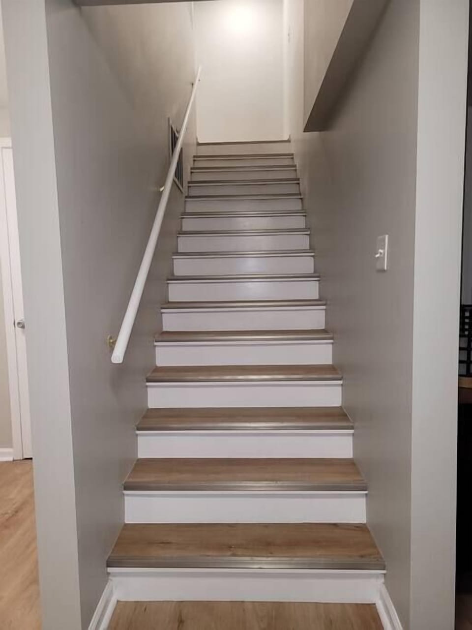 Staircase from Basement King Bedroom to Main Floor 