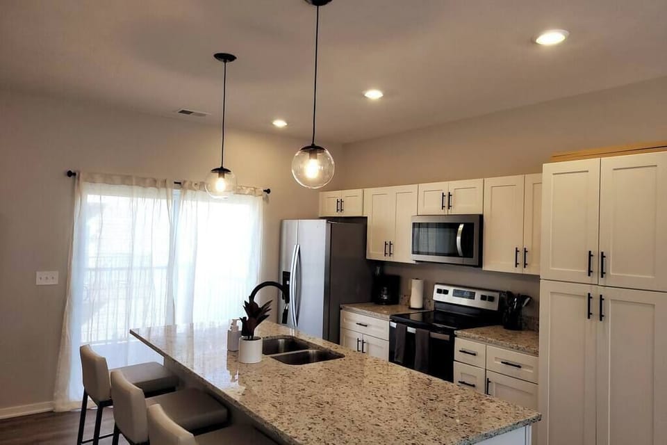 Patio located off the kitchen area, perfect for entertaining! 