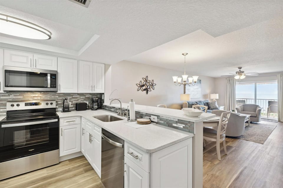 A beautifully designed kitchen with modern appliances and an open layout, perfect for cooking and entertaining.