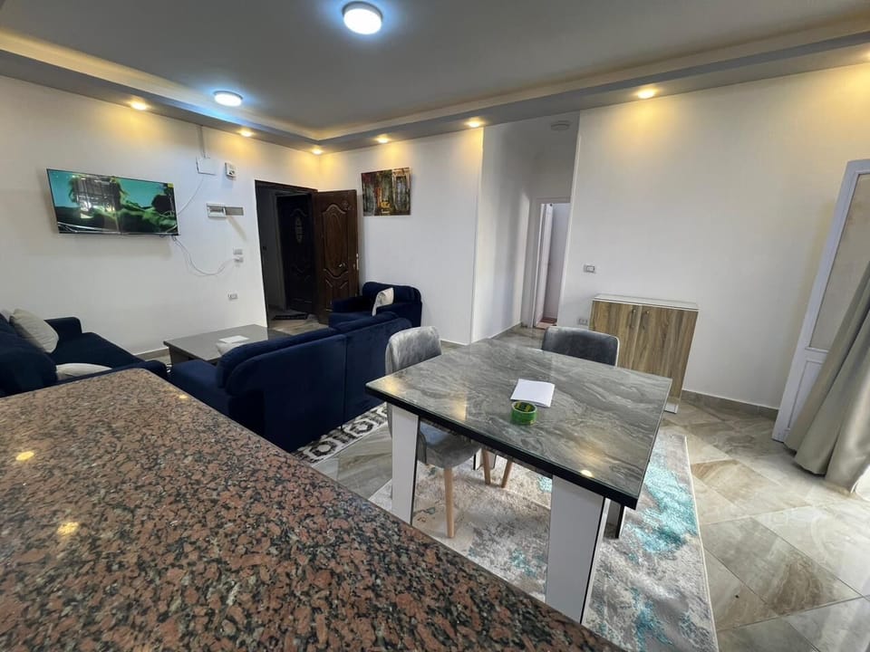Comfort Apartment, Balcony, City View | Living area | Flat-screen TV