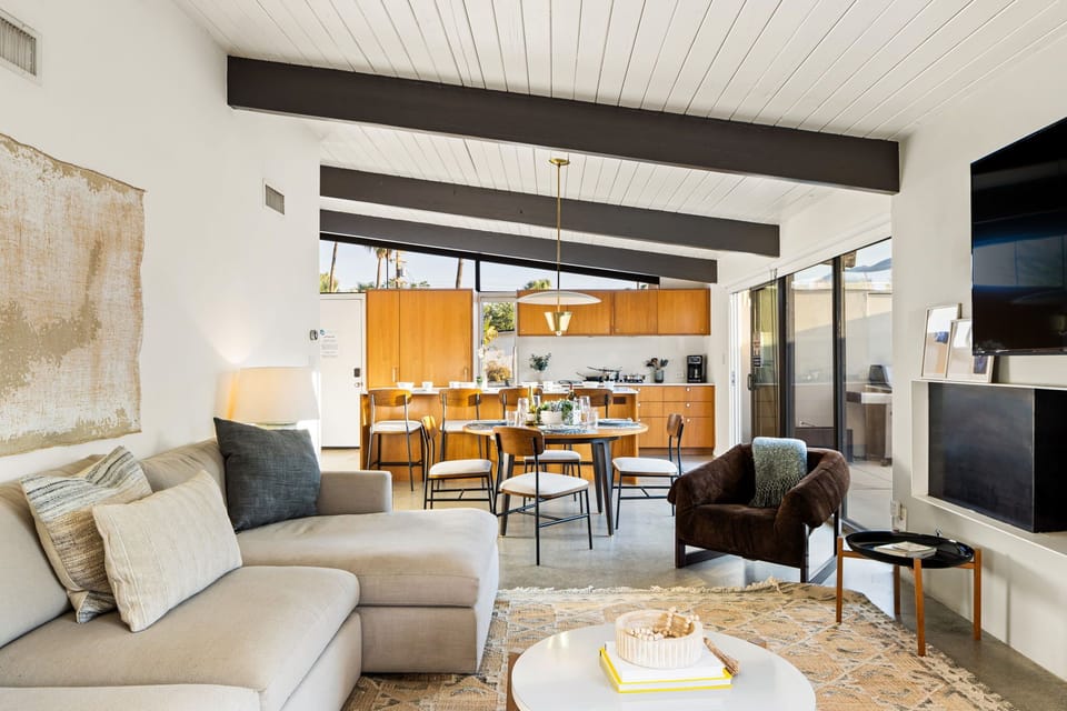 Seamlessly connected dining, kitchen, and living spaces create the perfect blend of comfort and style for every occasion.