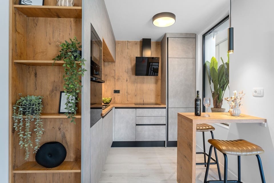 Kitchen equipped with high-end appliances and tasteful decor