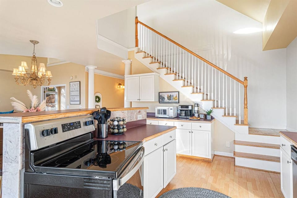 Kitchen Delight: Modern appliances and bright decor for culinary adventures await!