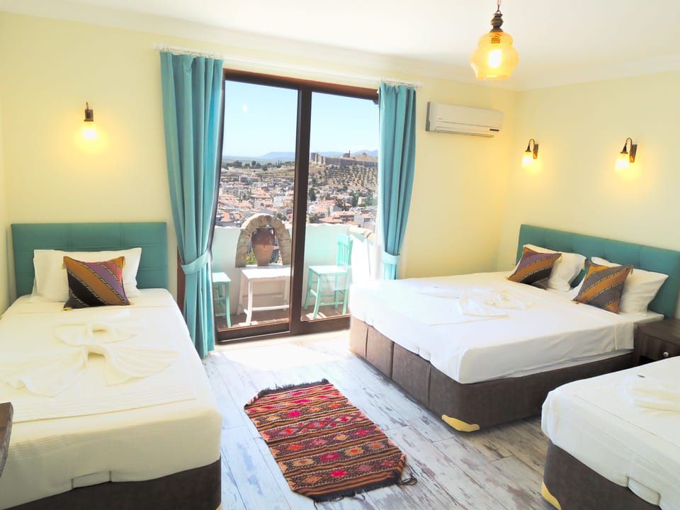 Family Room, Balcony, City View | In-room safe, desk, free WiFi, bed sheets