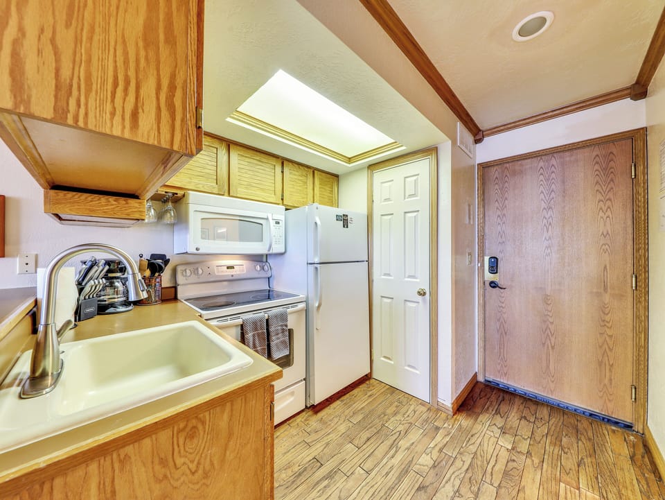Kitchen Kitchen Microwave, Range, Stove, Sink, Refrigerator, Cabinetry, Pantry, Coffee Machine