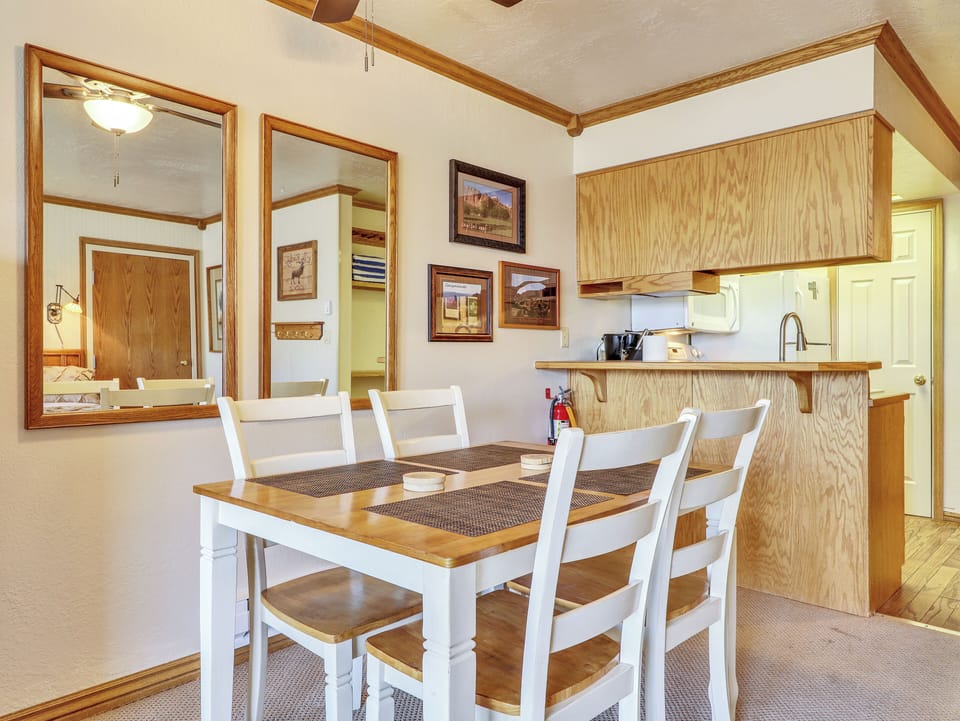 Dining Area Dining Area Dining Table & Chairs, Ceiling Fan, Wall Art