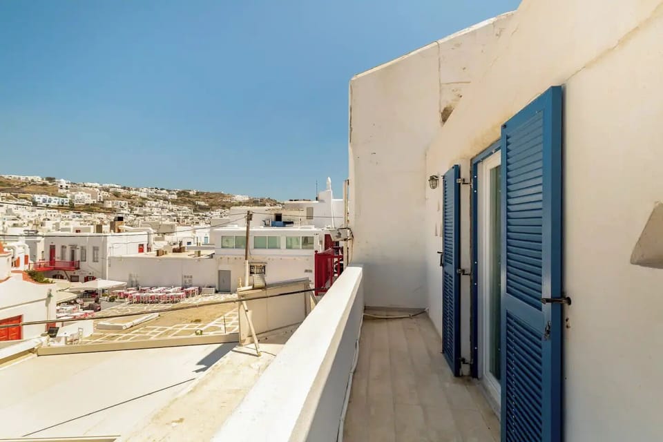 Bedroom balcony view of Mykonos town. Niko's taverna is across the square.