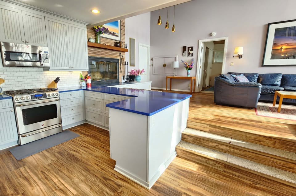 Beachwood Kitchen - Kitchen area showing living room and fireplace.