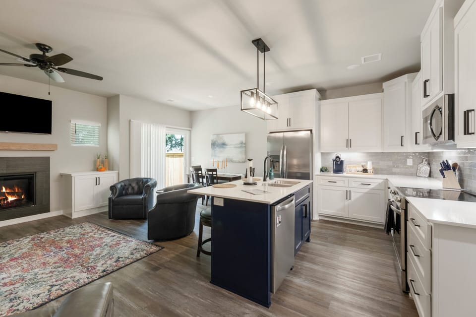Living area, kitchen, and dining (2)