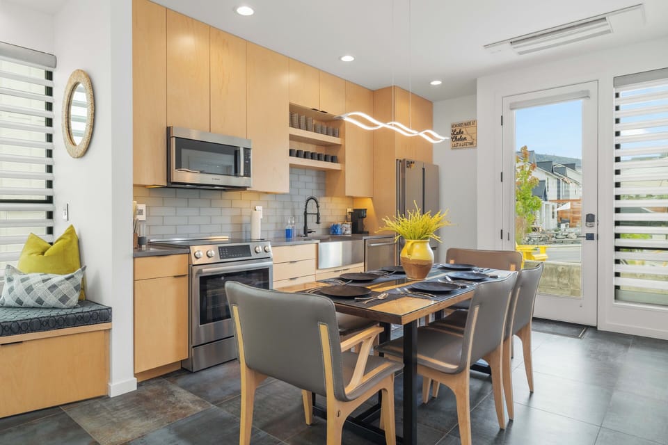 The dining room and kitchen.