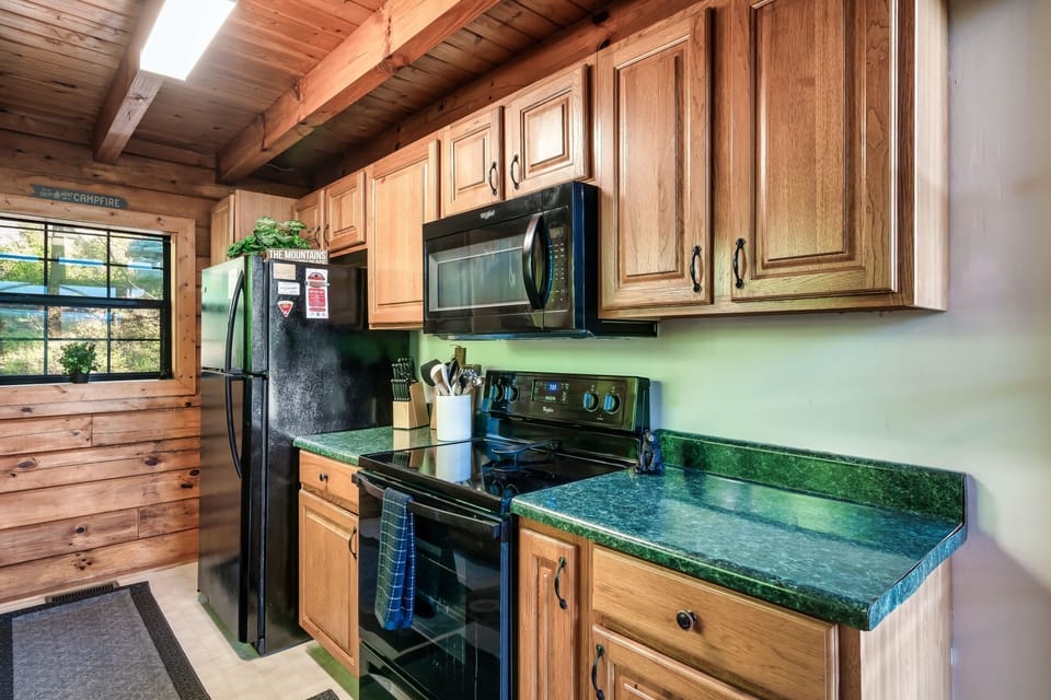 Electric stove and microwave; full size refrigerator