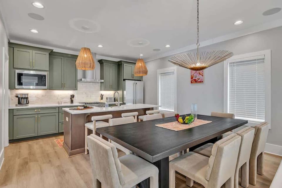 2nd Floor: Formal dining area featuring a large table set to accommodate 8 guests.