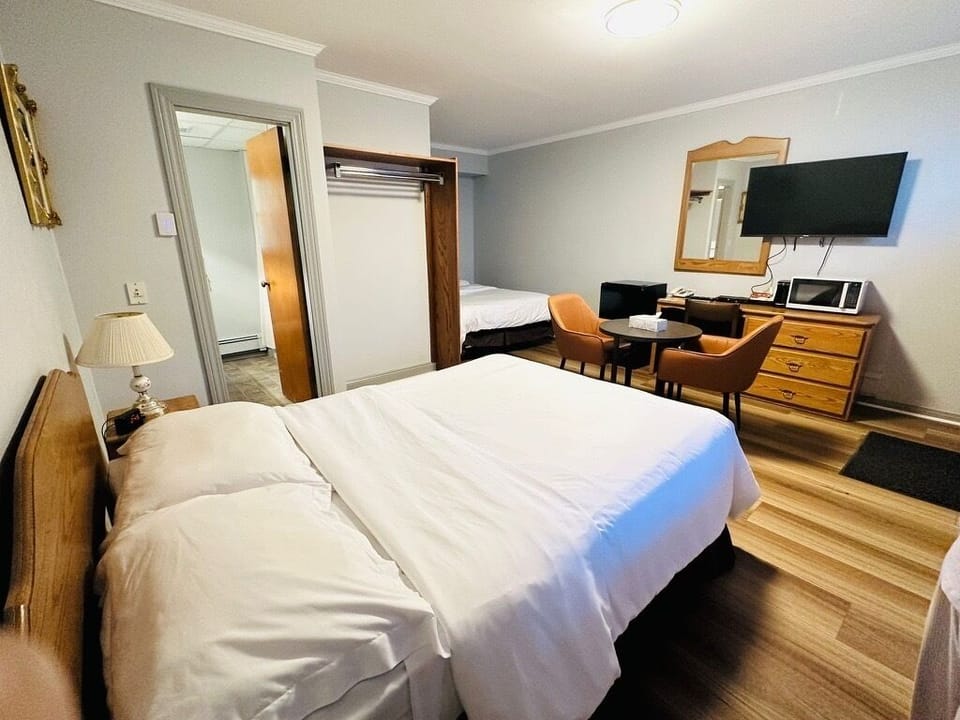 Room, 2 Queen Beds, Non Smoking | Desk, iron/ironing board, free WiFi, bed sheets