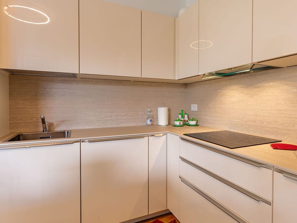 Cabinetry, Countertop, Property, Kitchen Sink, Sink, Kitchen Appliance, Tap, Kitchen Stove, Kitchen, Wood