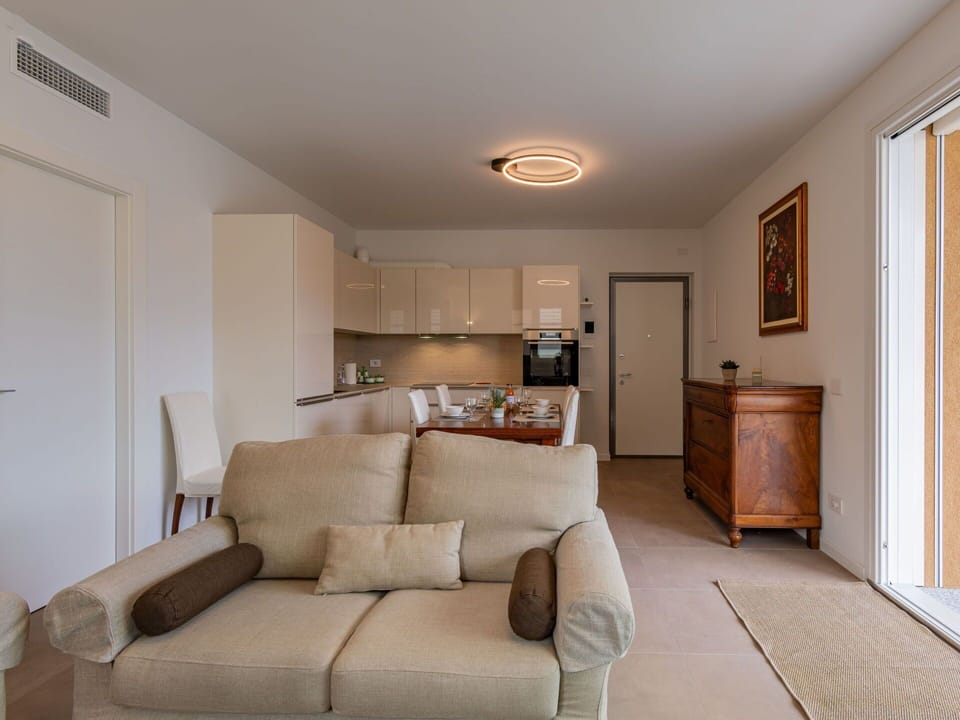 Property, Couch, Wood, Lighting, Interior Design, Floor, Living Room, Flooring, Comfort, Picture Frame