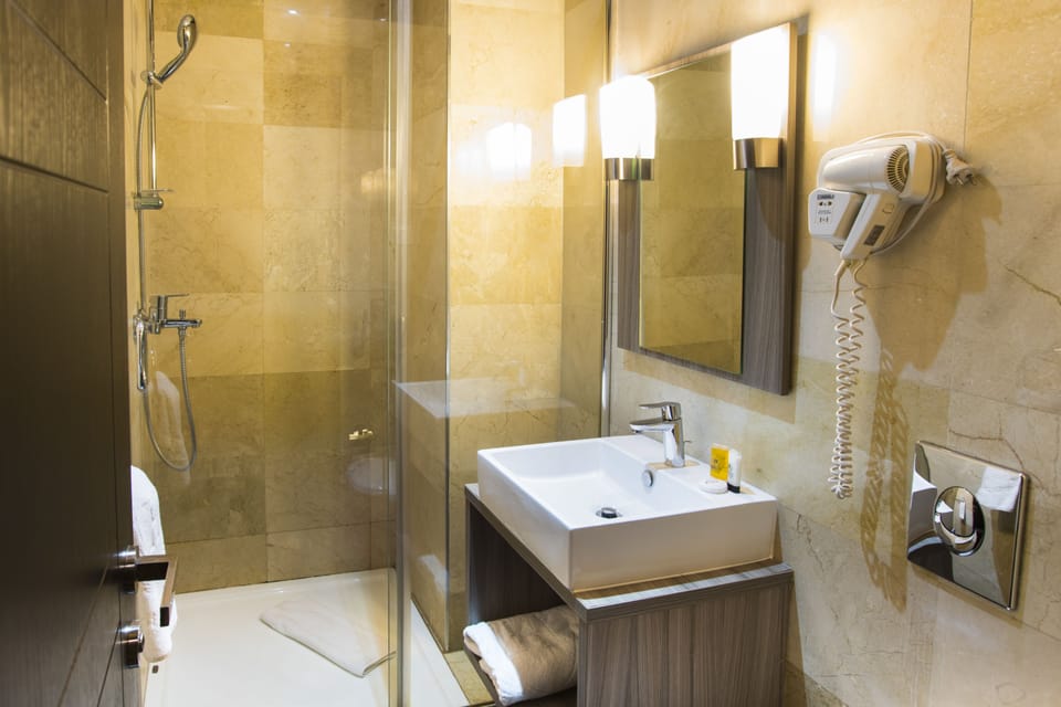 Free toiletries, hair dryer (on request), towels