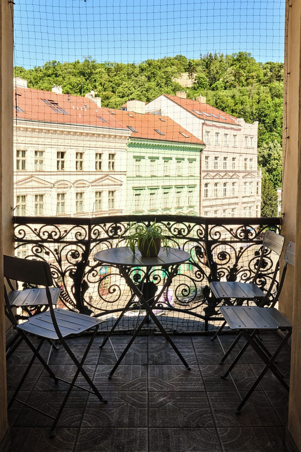 balcony boasts nice views of nearby parks