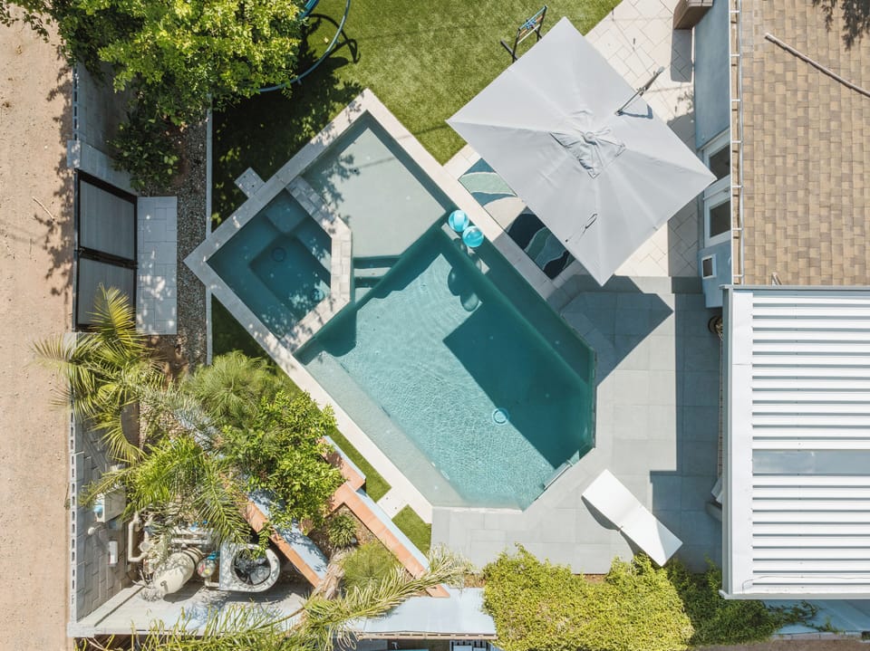 Heated pool with endless swim machine and spa! 