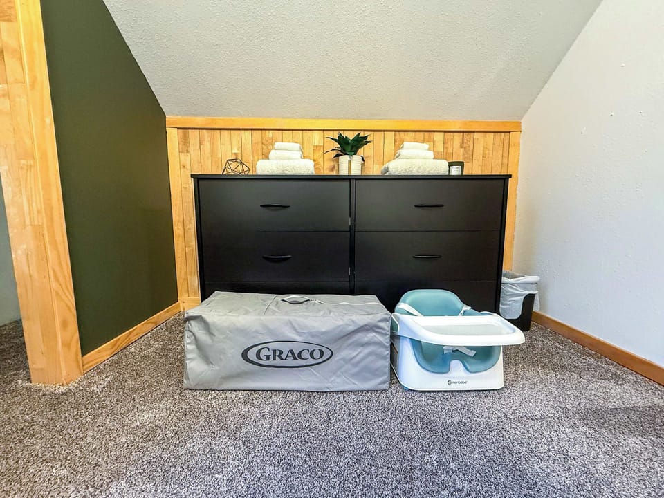 The bedroom closet also stores a pack'n'play and booster seat for the little ones.