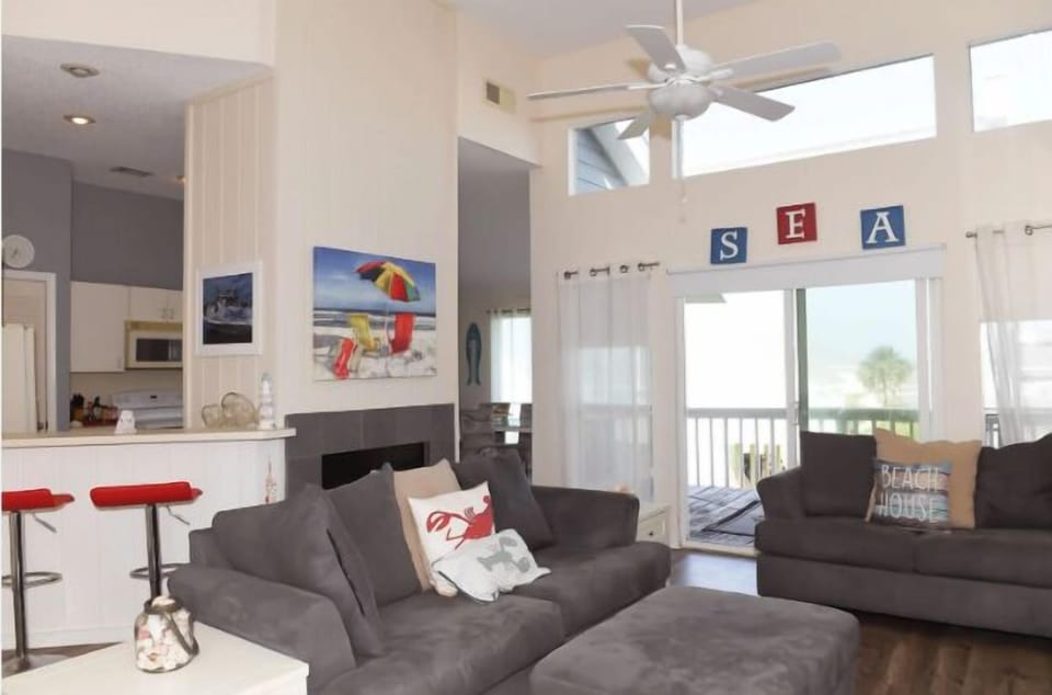 Enjoy some relaxation in our comfortable living area!  Gulf View and a very short walk to the beach!    Lounge on the second or third-floor balcony to enjoy the fresh gulf breeze.