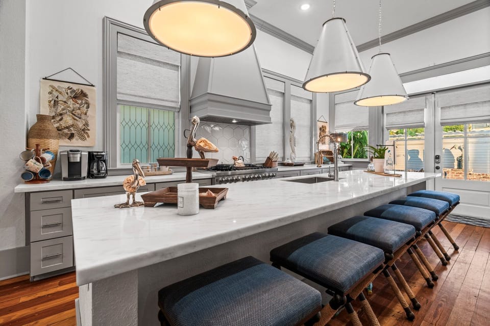In addition to a large dining table, there is bar seating, as well.