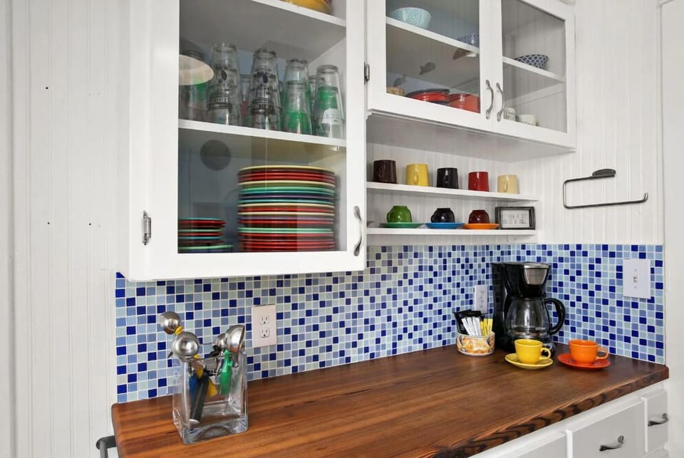 Stocked with plenty of dishes, pots and pans, and bakeware as well as coffee service including coffee, creamer, sweetener, and sugar to get you started.  If you prefer Keurig cups, please bring your favorites