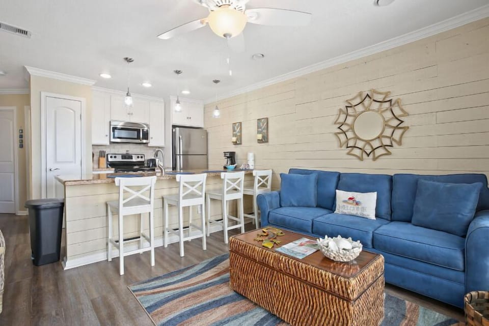 Updated with a cool, coastal vibe! Sleeper sofa in living room.