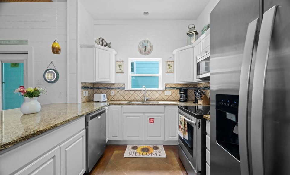 Kitchen — White Cabinets, Granite Counters & Tile Backsplash