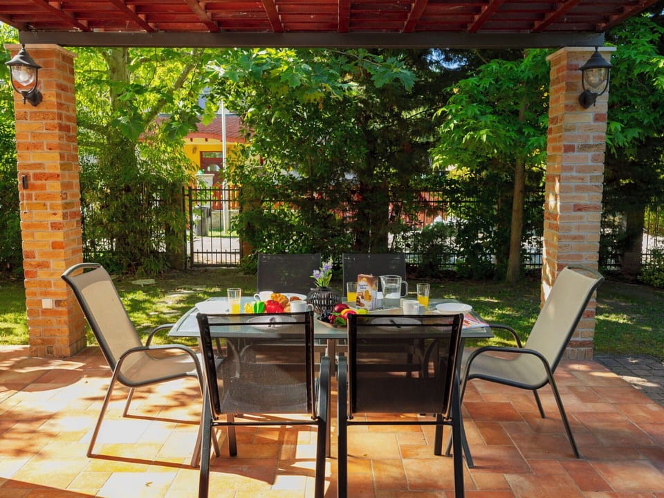 Furniture, Chair, Table, Outdoor Furniture, Kitchen & Dining Room Table, Outdoor Table, Restaurant, Shade, Backyard, Garden