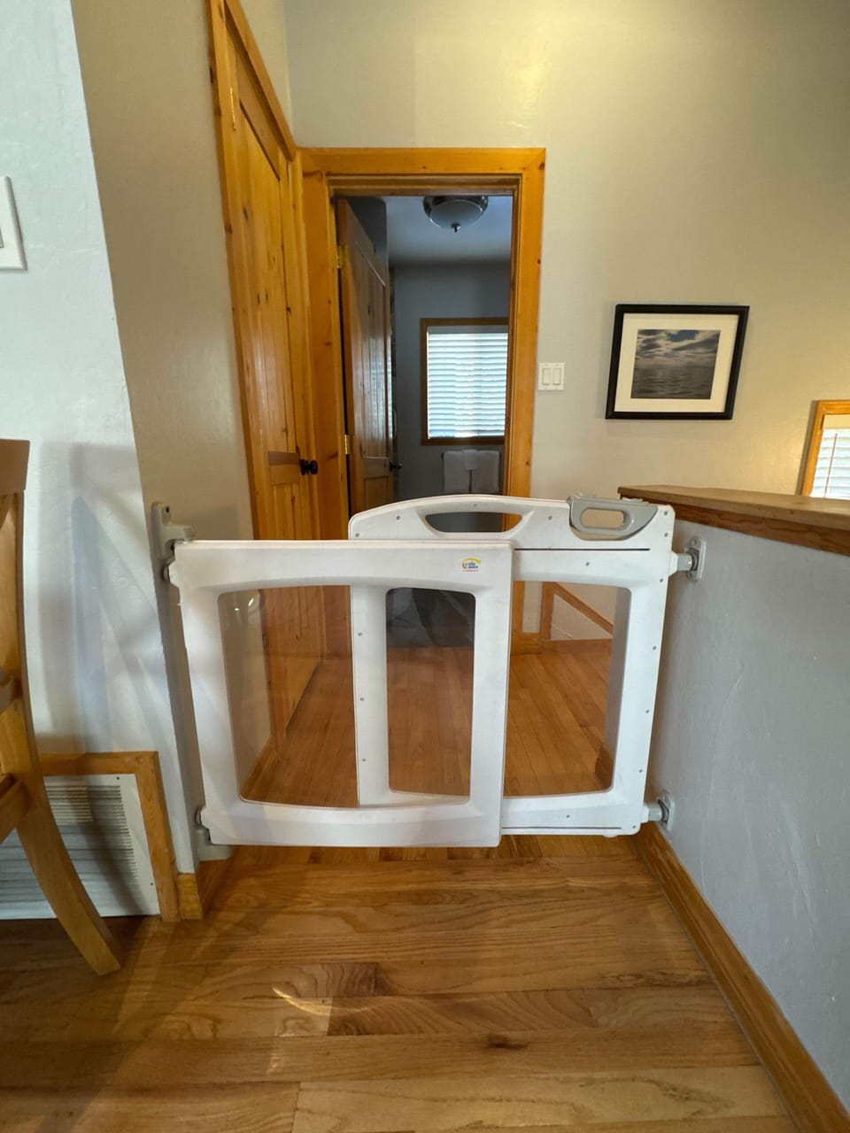 Wall-mounted baby gate