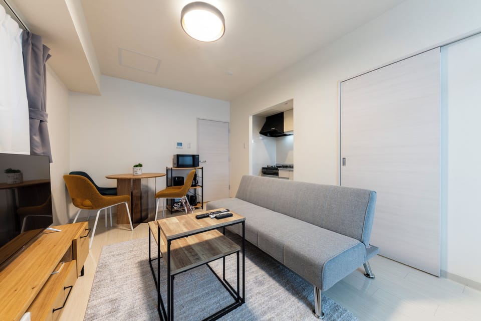Basic Apartment | Living area | Flat-screen TV