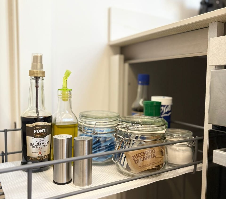 Kitchen essentials provided: sugar, oil, vinegar, salt and pepper.
