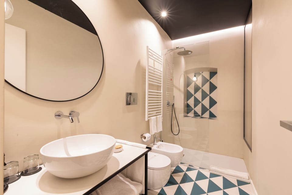 Tripla Luxury | Bathroom | Free toiletries, hair dryer, slippers, towels