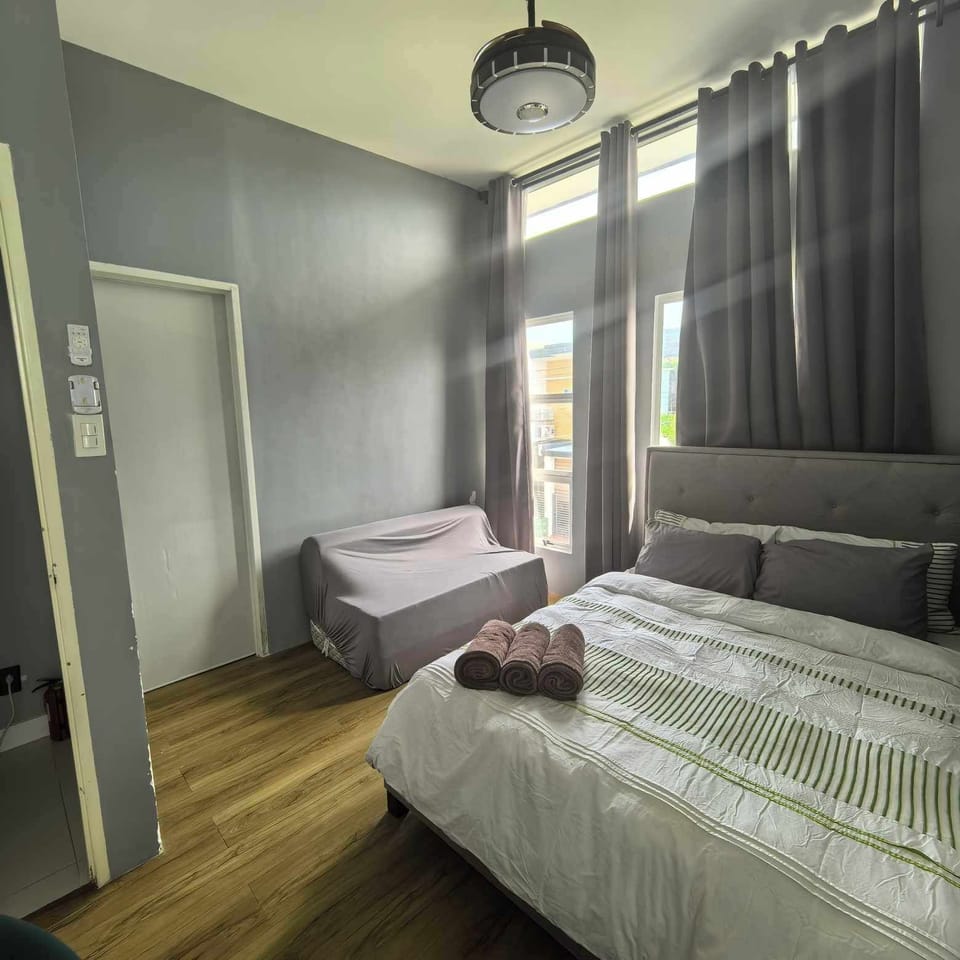 Grand Room | Premium bedding, down comforters, iron/ironing board, free WiFi