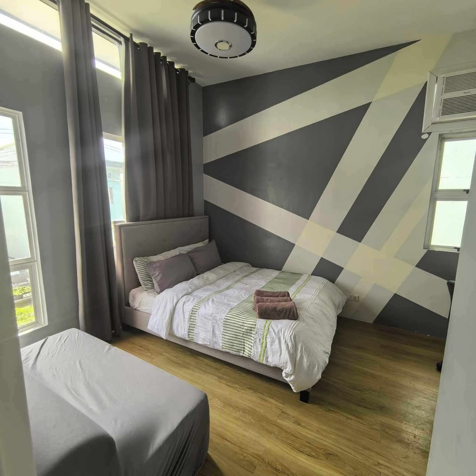 Grand Room | Premium bedding, down comforters, iron/ironing board, free WiFi