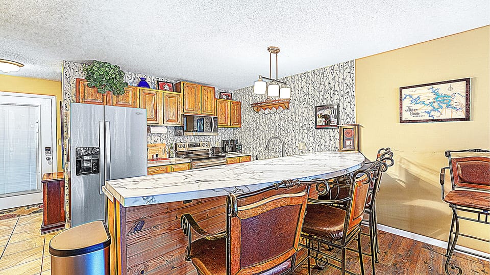 Large breakfast bar with seating for 5.