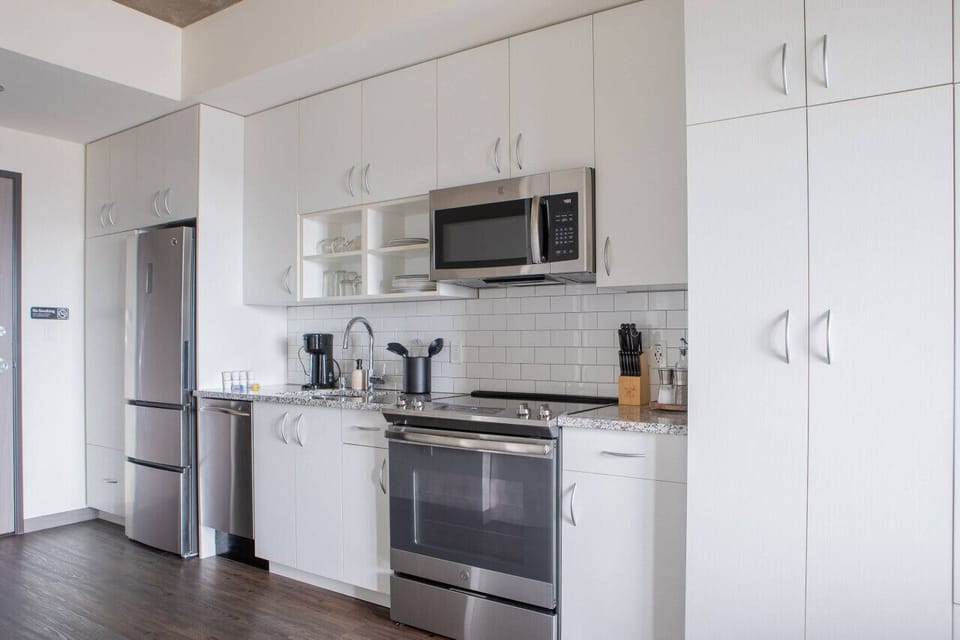 Chef-ready kitchen featuring modern appliances and all the essentials for a home-cooked meal