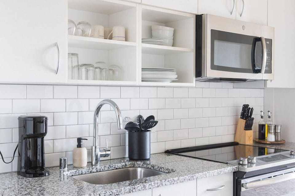 Chef-ready kitchen featuring modern appliances and all the essentials for a home-cooked meal