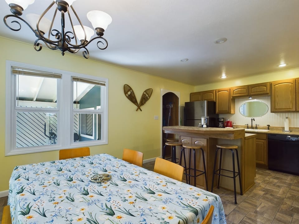 Spacious kitchen with dining area.