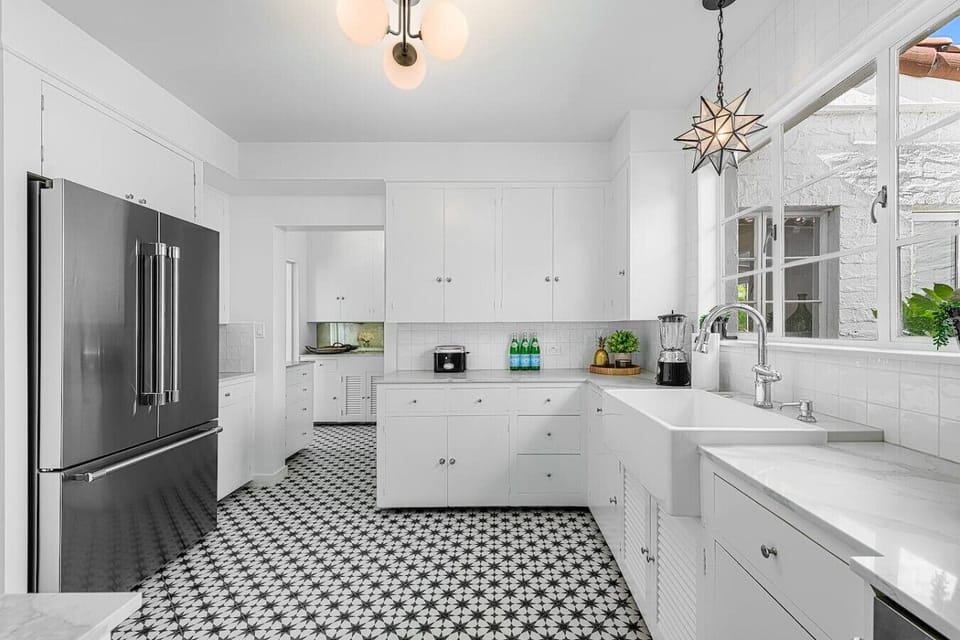 Stylish Fully-Equipped Kitchen With Butler Pantry In Background