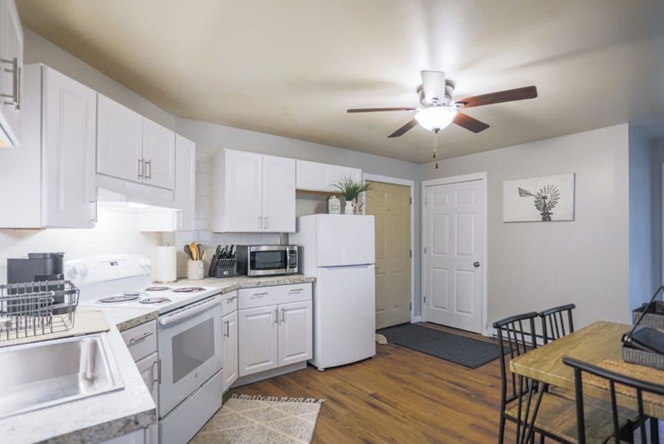 Modern kitchen with high-end appliances and light