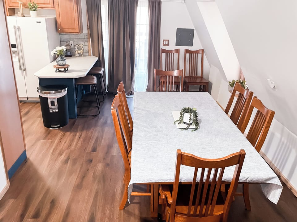The large dining area is perfect for good meals and making memories. Can seat 8!