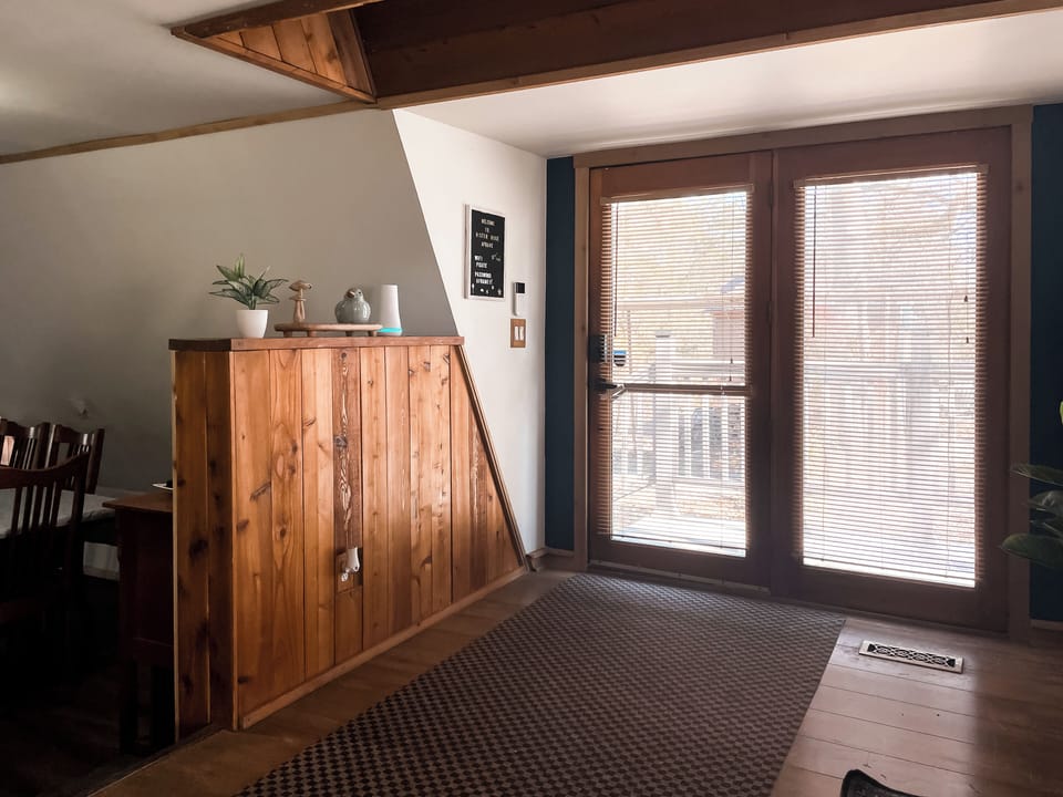 Entry space with step down to the kitchen and dining area.